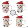 Kép 3/5 - Bögre Porcelán karácsonyi 3,7dl tetővel fémszűrővel,Christmas Frie dobozban