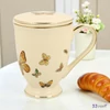 Bögre porcelán 400ml BUTTERFLIES ECRU-pillangós Díszdobozban teaszűrővel