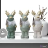 Karácsonyi dekor szarvas 24' 3 féle kerámia figura 9.5cmx8.7cmx22cm sdkae