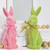 Nyuszi flokkolt figura 26cm Kerámia masnival exkluzív húsvéti tavasz termék rózsaszín/zöld 2féle 1db/ár SDGW2