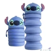 Kép 1/2 - Tolltartó Bővíthető zipzárral Stitch fej jel összenyomható Colorino