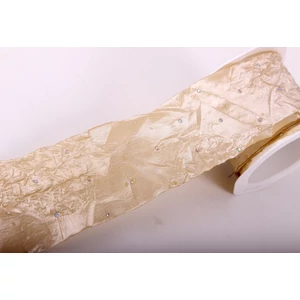 Szalag textil gyűrt köves 62mm arany